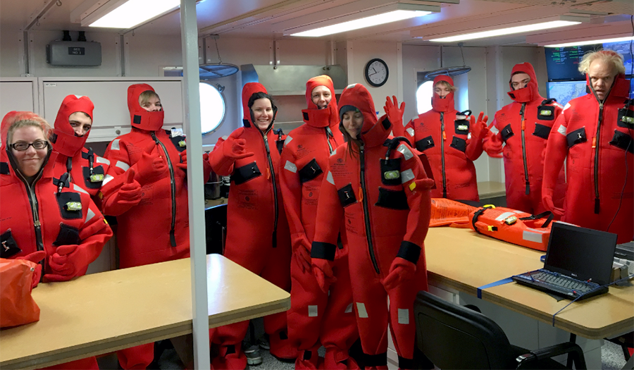 Group of students in their red immersion suits.