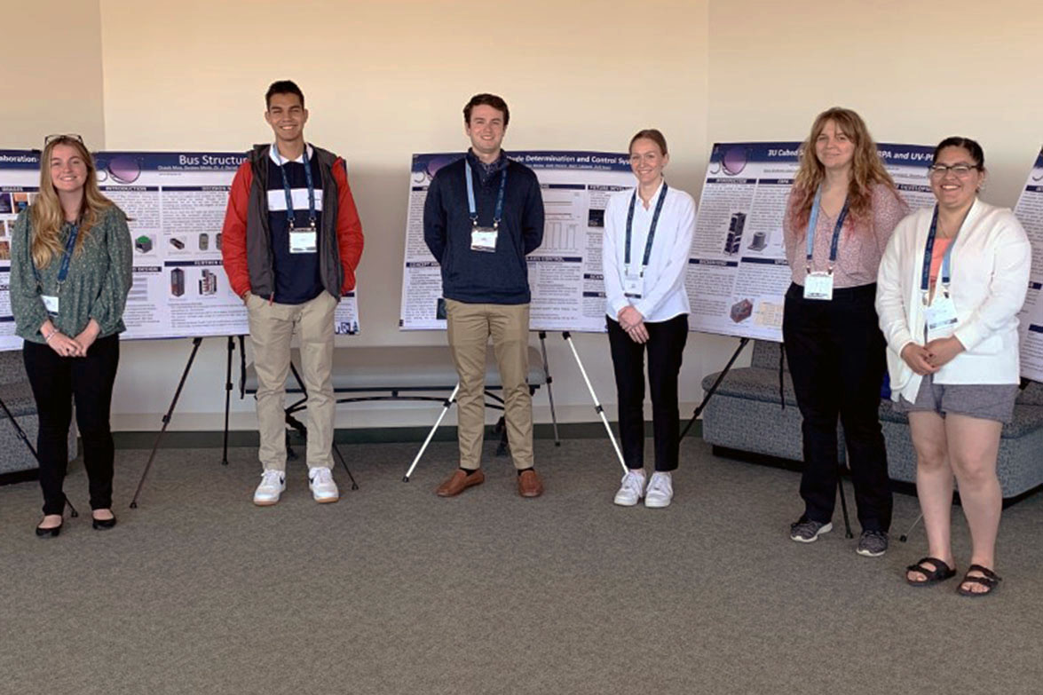Photo of UNH and Sonoma students with their cubestat presentations.