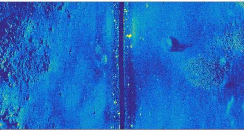 Blue sonar image of seafloor. 