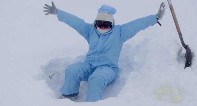 Sampling snow in a clean suit at Summit Station in Greenland in June 2010. 