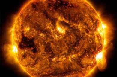 Fiery sun with solar flares.