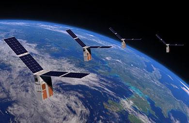 Illustration of 4 satellites arcing over Earth.