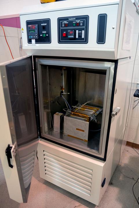 Photo of thermal cycling chamber with door open.