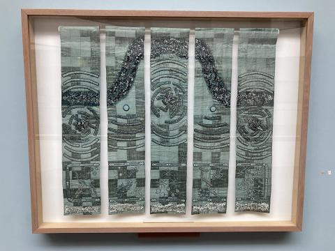 The 5-panel textile acoustics artwork framed.
