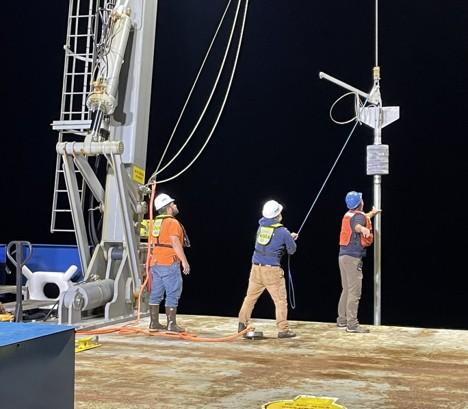 deploying U.S. Geological Survey’s piston corer on RV103