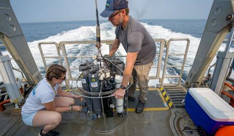 Kerry aboard UNH's R/V Gulf Challenger preparing the CTD rosette for sample collection. 