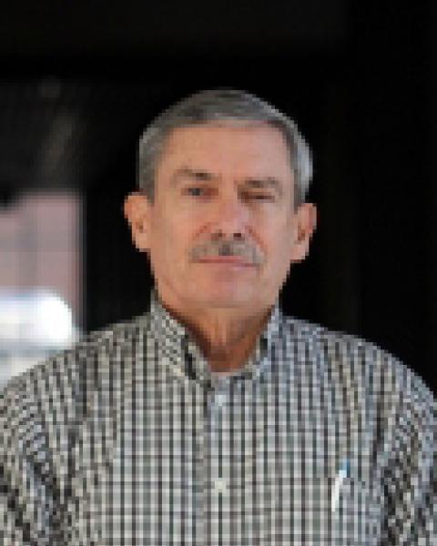 A headshot of James Ryan, a professor in the Space Science Center.