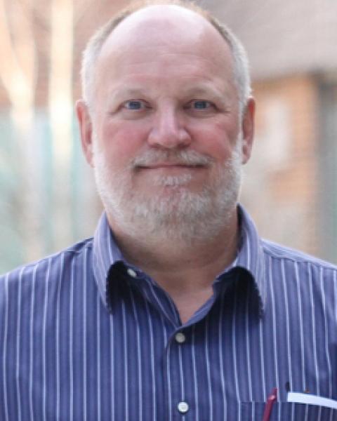 A headshot of Joachim Raeder, a professor in the Space Science Center.