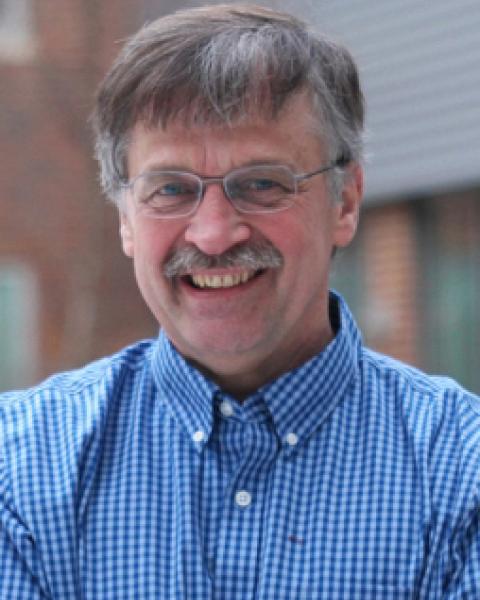 A headshot of Marc Lessard, an associate professor in the Space Science Center.