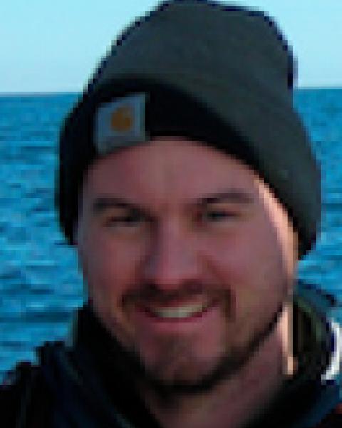 A headshot of Shawn Shellito, a research scientist with the Ocean Process Analysis Laboratory.