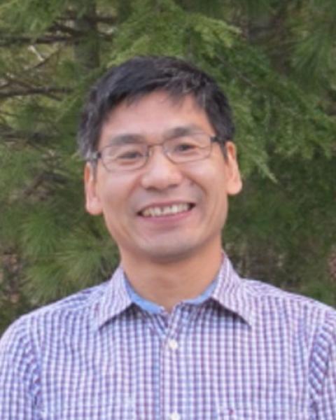 A headshot of Zaixing Zhou, a research scientist in the Earth Systems Research Center.