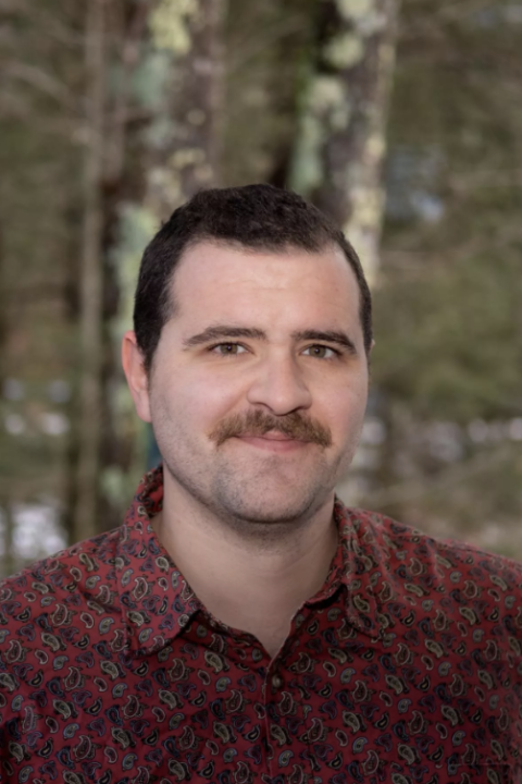 Headshot of Amaro Tuninetti in EOS Center for Acoustics Research and Education.