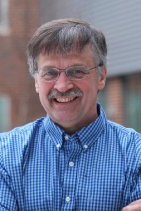A headshot of Marc Lessard, an associate professor in the Space Science Center.