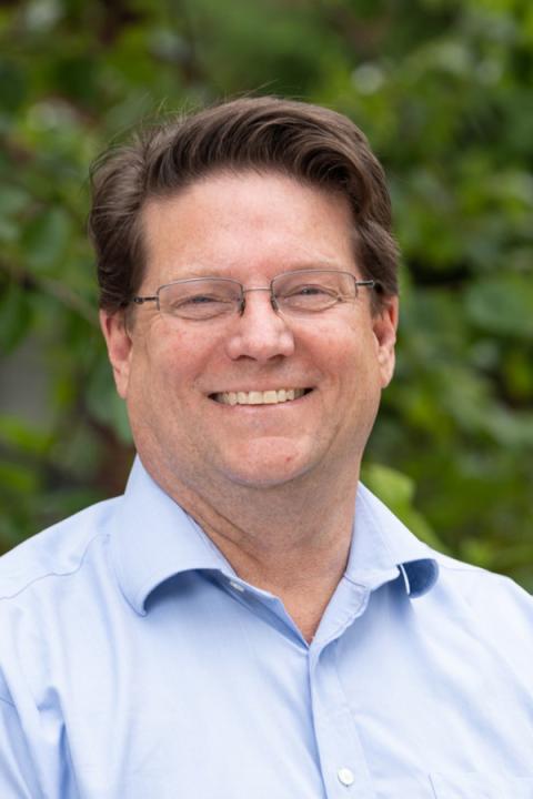 A headshot of James Clemmons, a professor in the EOS Space Science Center.