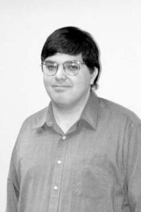 A headshot of Bernie Vasquez, a research professor in the Space Science Center.