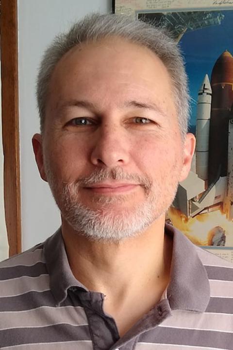 Color photo of employee.